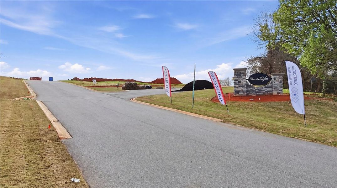 Entrance to the Davis Heights community in Inman, SC, featuring signage and landscaping (Image 2). Entrance to the Davis Heights community in Inman, SC, featuring signage and landscaping (Image 2).