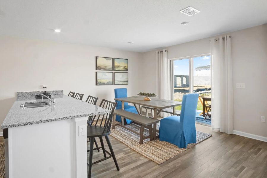 Furnished interior in a model home at The Reserve at Bradbury Creek in Haines City (Image 10).