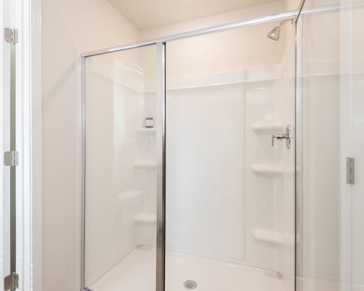 A sleek, walk-in shower built for everyday luxury.