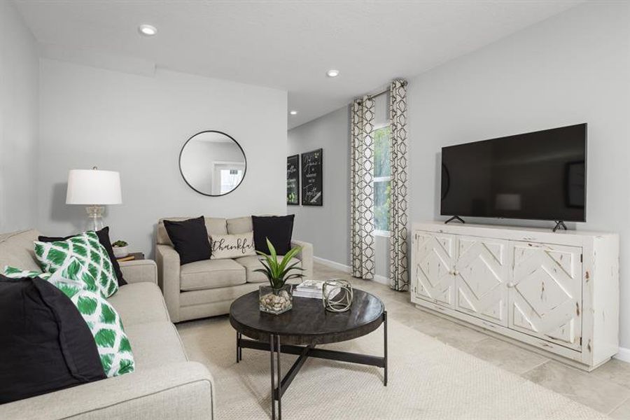 This welcoming space is the perfect for book club, coffee with neighbors, or relaxing movie nights