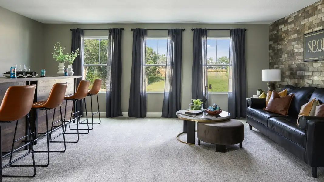 Furnished interior in a model home at Pasadena Woods in Dade City (Image 21).