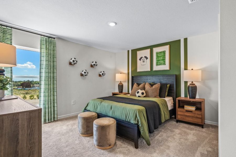 Furnished interior in a model home at Woodland Ranch Estates in Dundee (Image 17).
