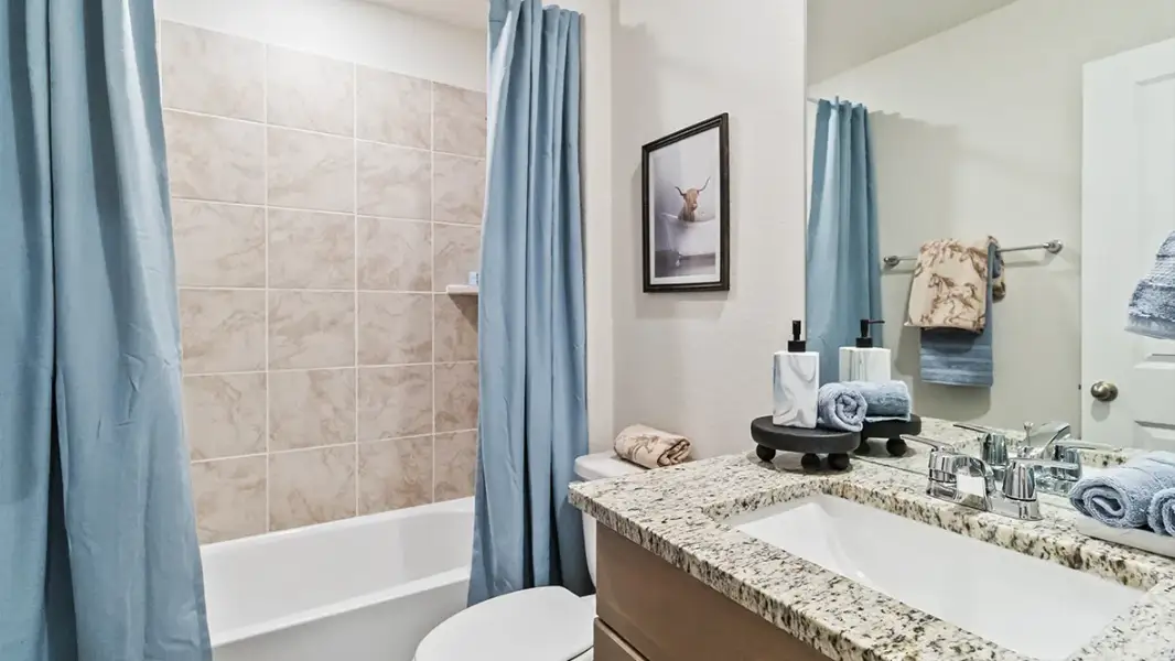 Furnished interior in a model home at Saddle Ridge Estates in Lytle (Image 27).