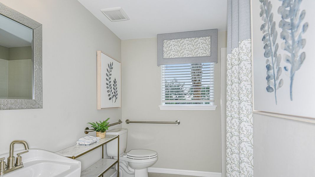 Furnished interior in a model home at Bella Via in Port Charlotte (Image 23). Furnished interior in a model home at Bella Via in Port Charlotte (Image 23).