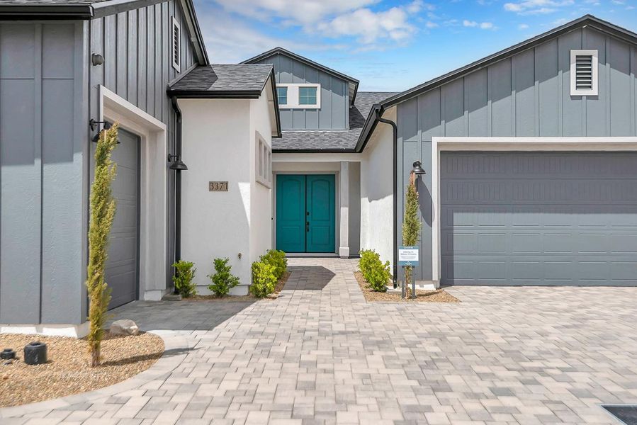 Front exterior of a home in the Summit at The Dells community, located in Prescott, AZ (Image 15).