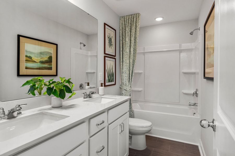 Furnished interior in a model home at Gregory Village Townhomes in Lillington (Image 41).