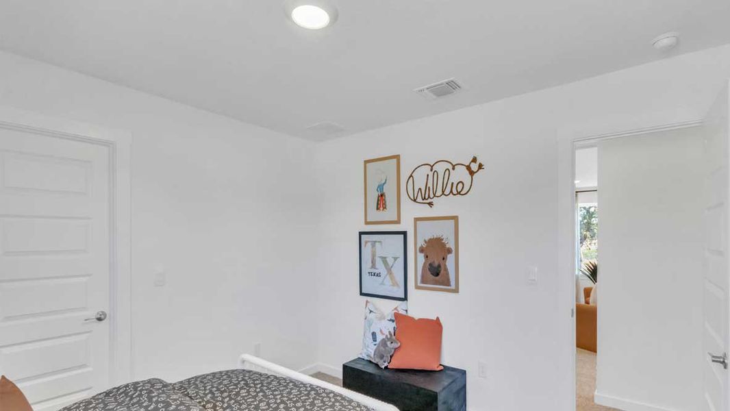 Furnished interior in a model home at Rosenbusch Ranch in Leander (Image 49).