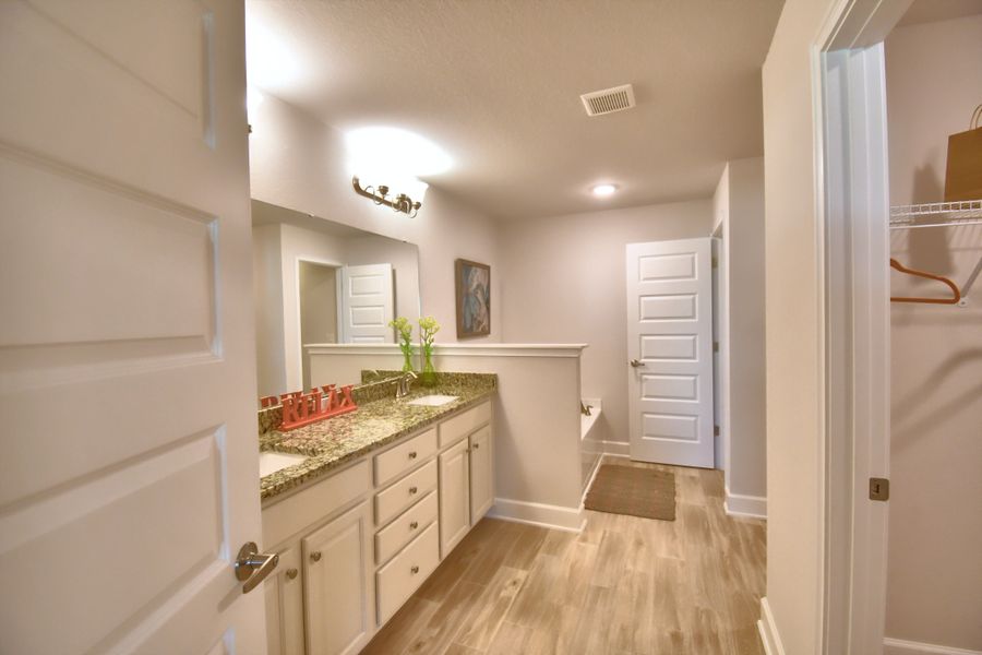 Furnished interior in a model home at Citrus Landing in Davenport (Image 27).