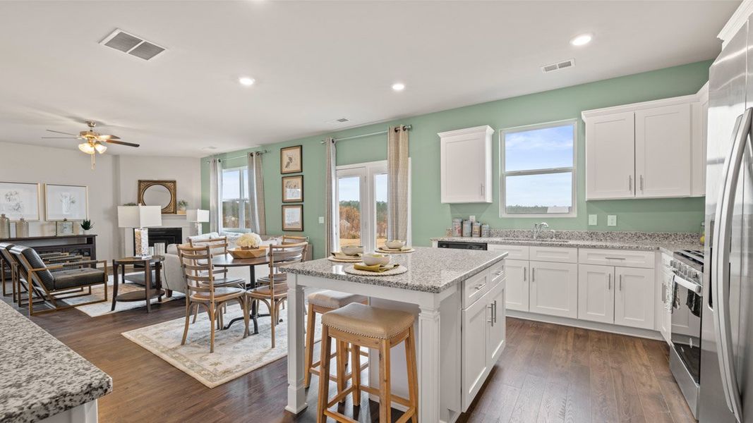 Furnished interior in a model home at Highland Hills in Graniteville (Image 15).