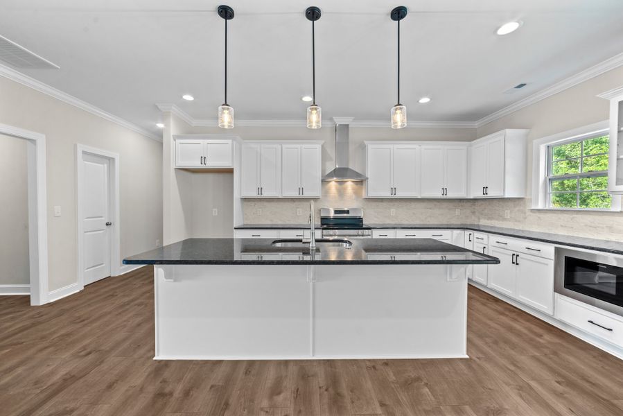 Furnished interior in a model home at The Villas at Langston Farms in Winterville (Image 7).