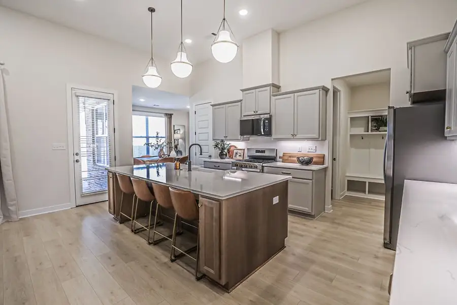 Furnished interior in a model home at Walker Farms in Bartlett (Image 6).