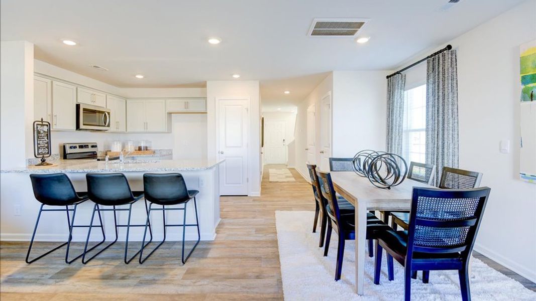 Furnished interior in a model home at Edinborough Townes in Gibsonville (Image 11).