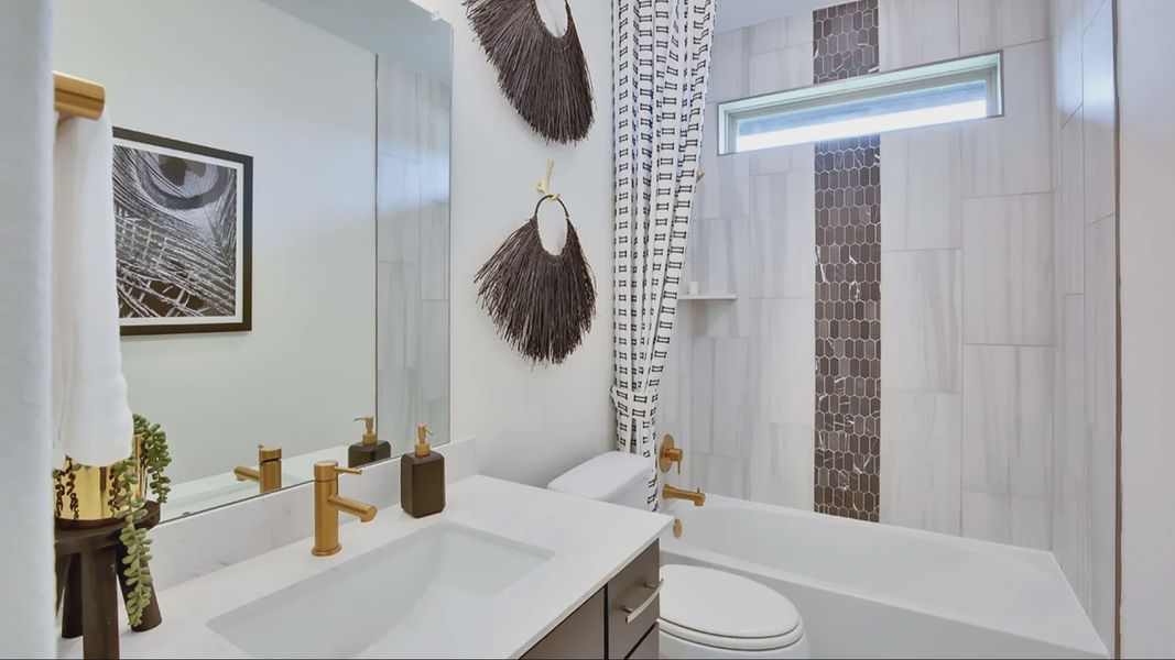 Furnished interior in a model home at Oaks at San Gabriel in Georgetown (Image 4).