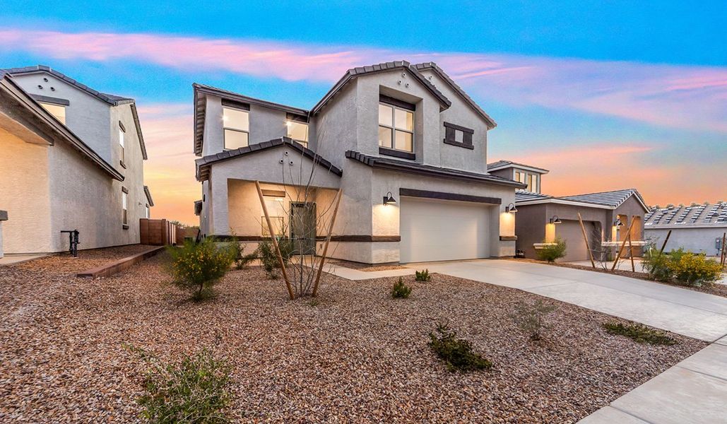 Front exterior of a home in the The Oasis at Rocking K community, located in Vail, AZ (Image 14).