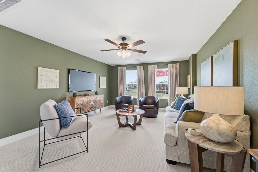 Furnished interior in a model home at Infinity Square in Kyle (Image 35).