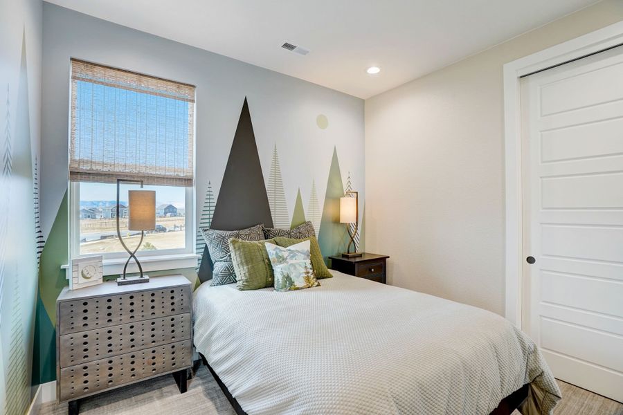 Furnished interior in a model home at Kitchel Lake at Serratoga Falls in Timnath (Image 30).