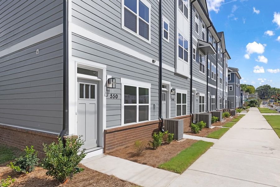 Front exterior of a home in the West End Townhomes community, located in Charlotte, NC (Image 2). Front exterior of a home in the West End Townhomes community, located in Charlotte, NC (Image 2).