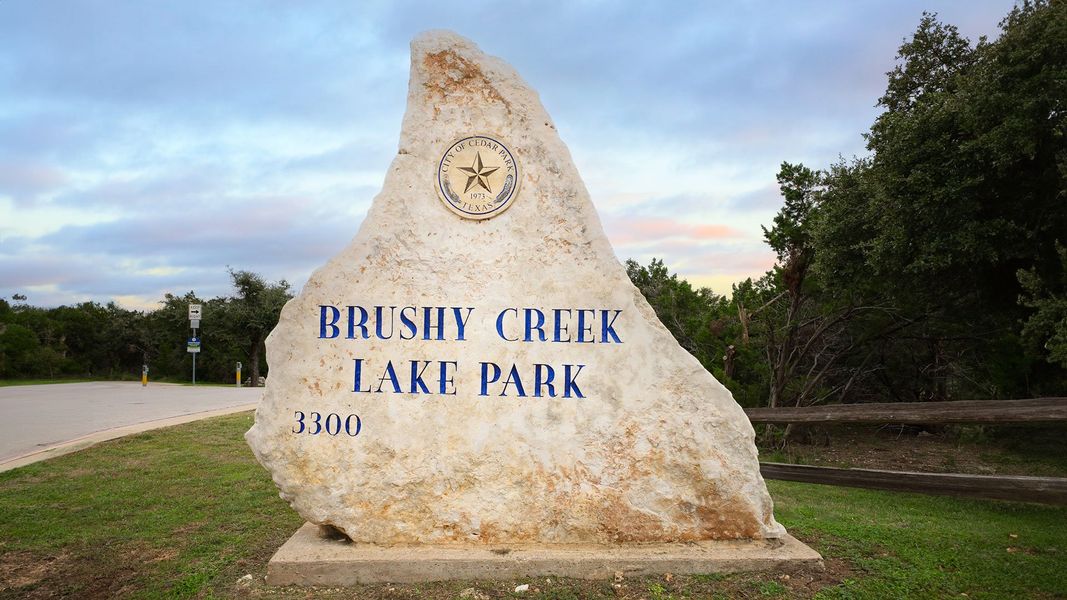 Entrance to the Clear Creek community in Round Rock, TX, featuring signage and landscaping (Image 2).