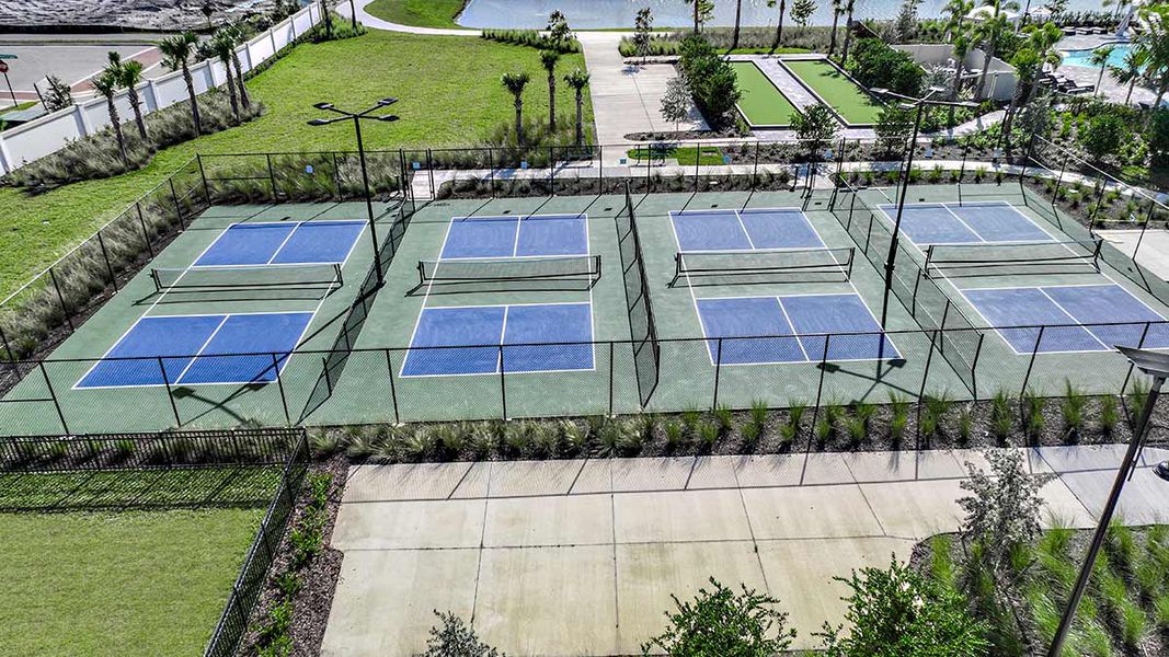 Front exterior of a home in the The Cove at West Port community, located in Port Charlotte, FL (Image 8). Front exterior of a home in the The Cove at West Port community, located in Port Charlotte, FL (Image 8).