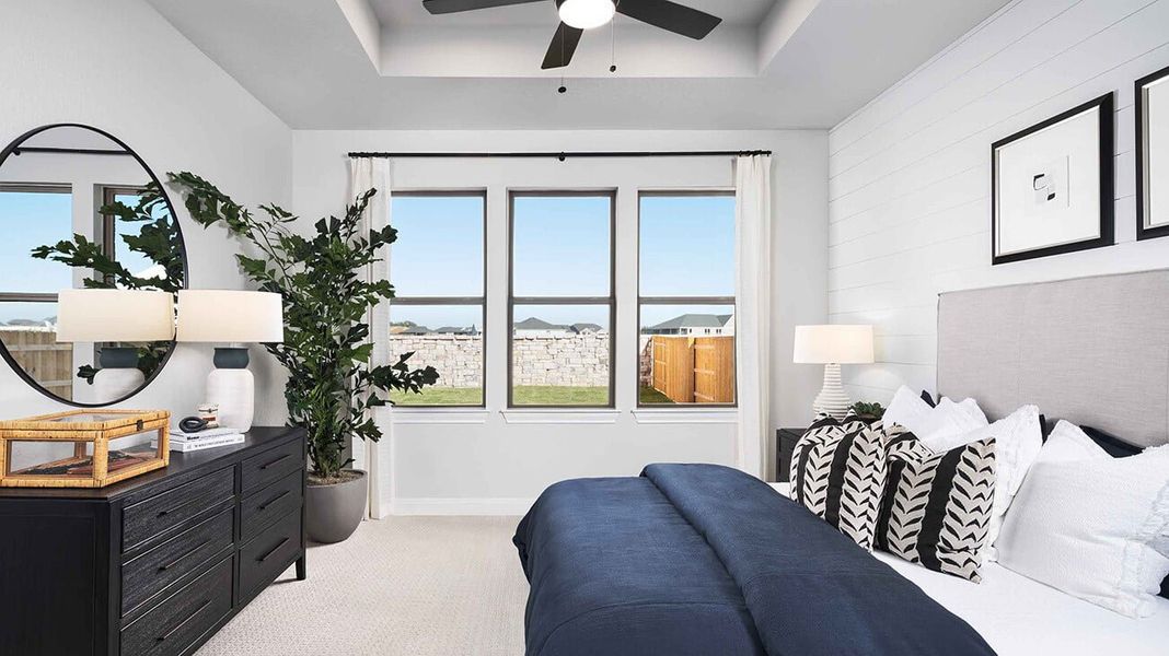 Furnished interior in a model home at 6 Creeks in Kyle (Image 22).