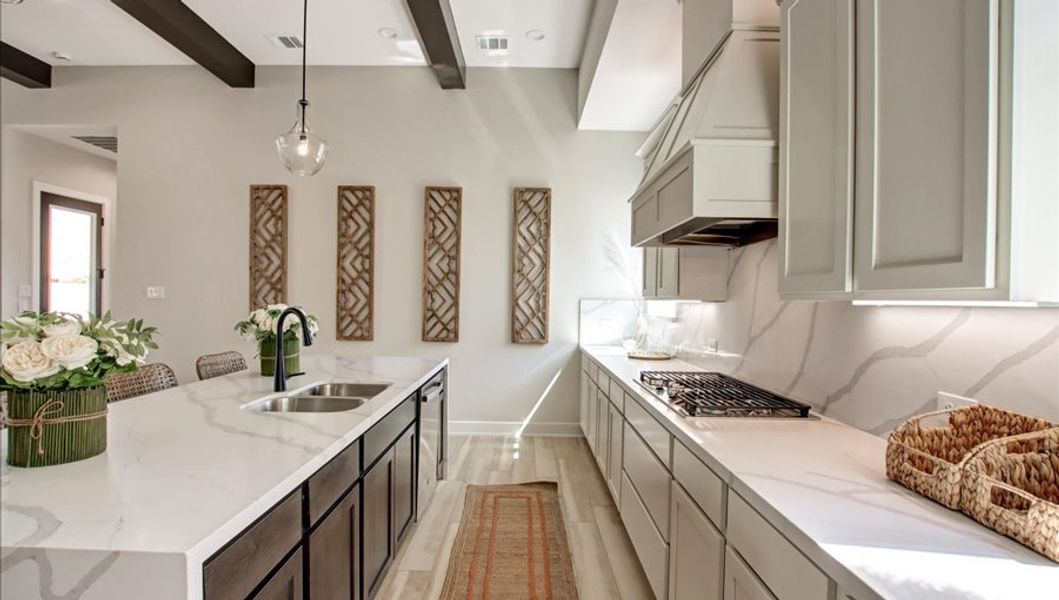 Furnished interior in a model home at Sunterra 40 in Katy (Image 28).