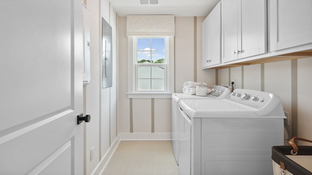 Furnished interior in a model home at Creekside at Andrews in Summerville (Image 12).