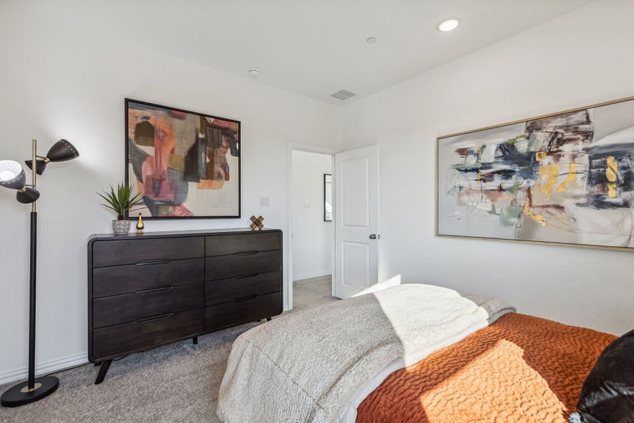 Furnished interior in a model home at Village on Main Street in Frisco (Image 40).