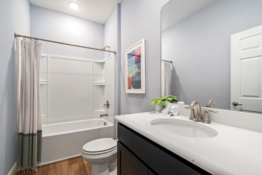 Furnished interior in a model home at The Lakes at St. Sebastian Preserve in Sebastian (Image 25).