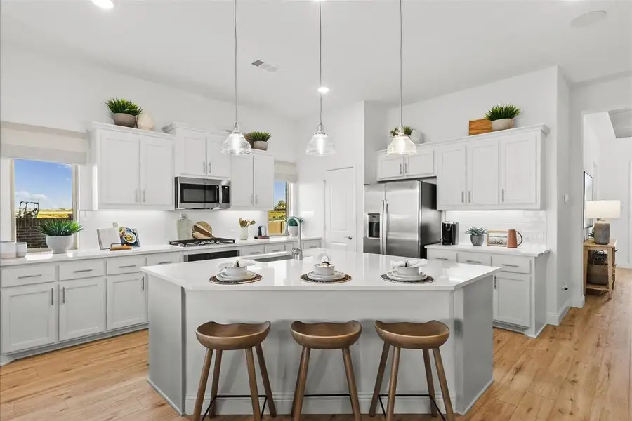 Furnished interior in a model home at Creekview Meadows in Pilot Point (Image 6).