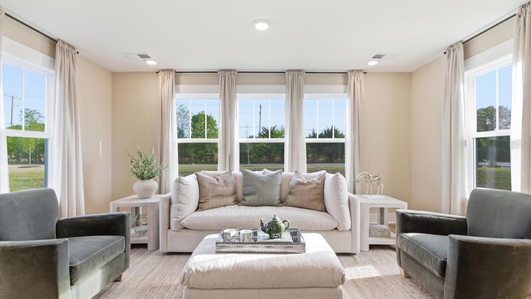 Furnished interior in a model home at Benjamin's Grove in Woodruff (Image 22).