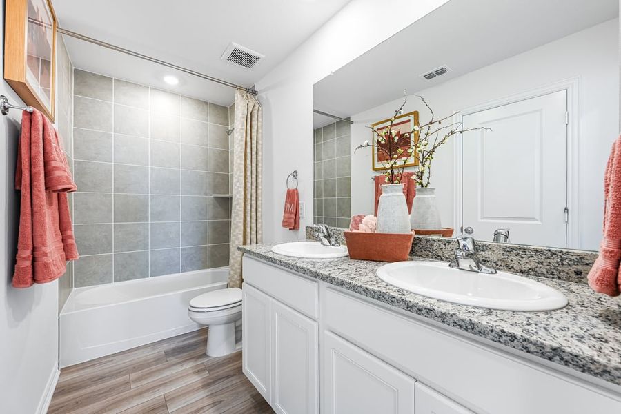 Furnished interior in a model home at River Ridge in Crandall (Image 132).