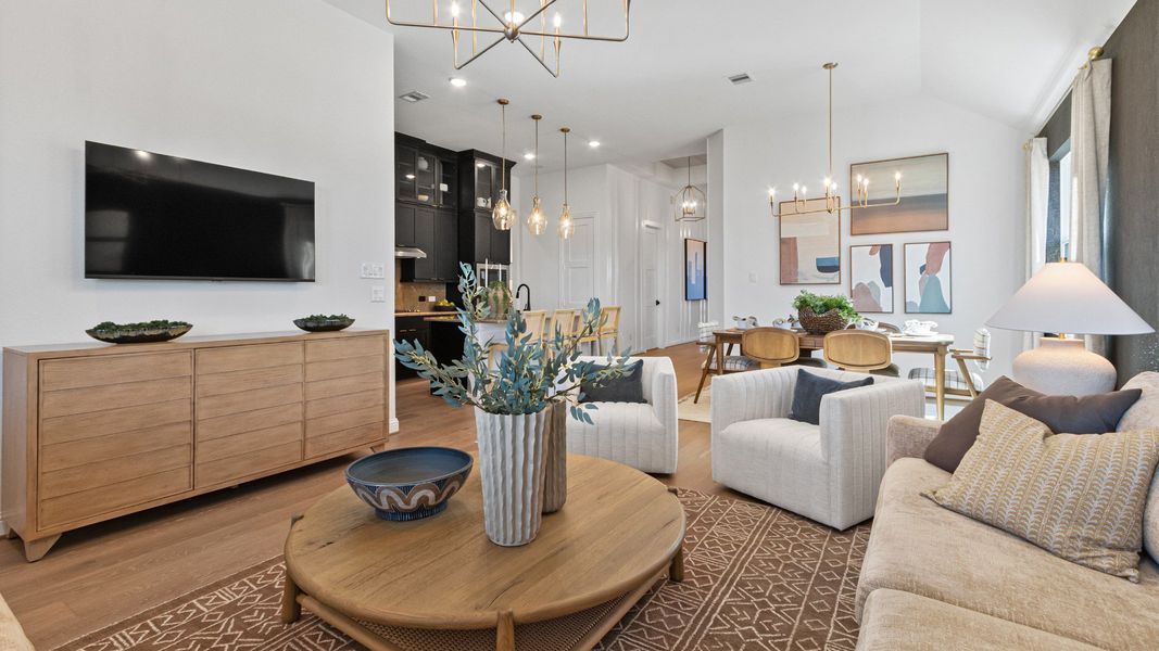 Furnished interior in a model home at Wildrye in Waller (Image 8).