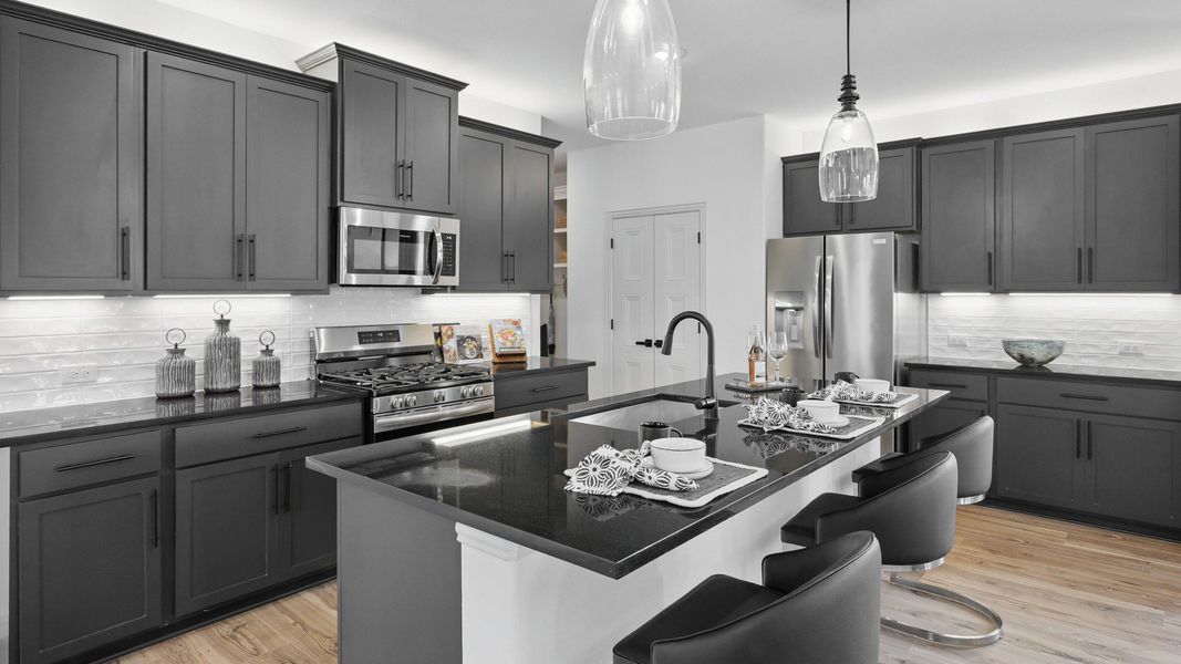 Furnished interior in a model home at Westridge Journey in McKinney (Image 13).