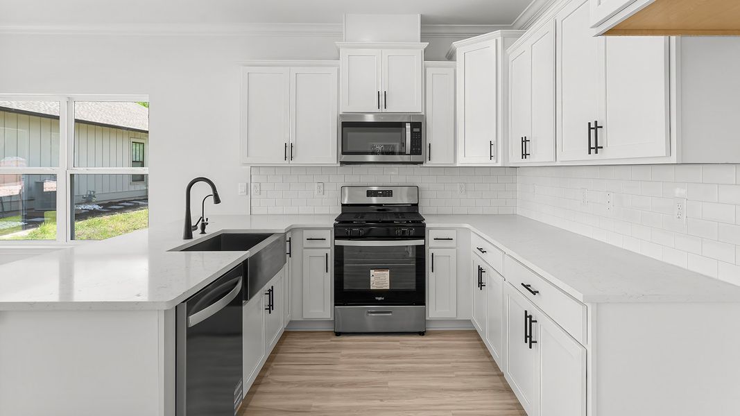 Furnished interior in a model home at Sanctuary Beach in Panama City Beach (Image 8).