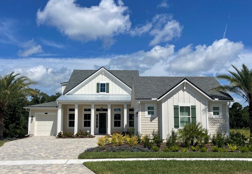 Front exterior of a home in the Courtney Oaks at SilverLeaf community, located in St. Augustine, FL (Image 1).