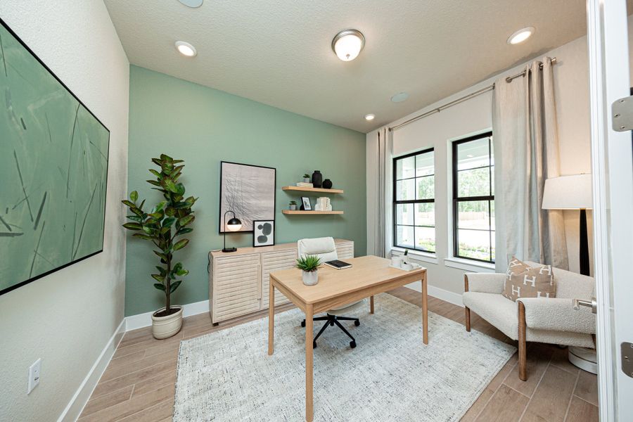 Furnished interior in a model home at Meridiana in Manvel (Image 19).
