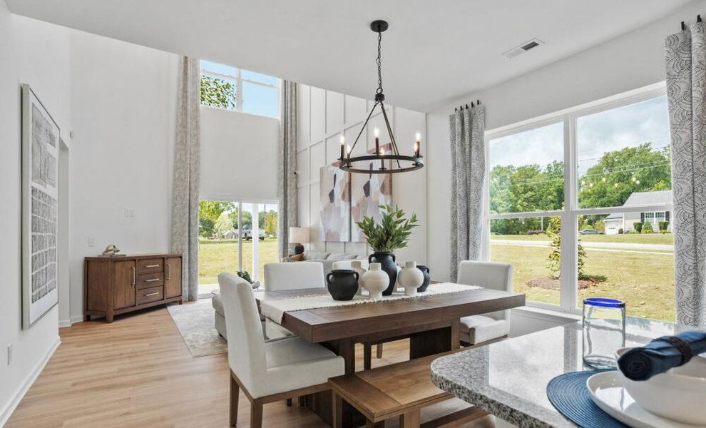 Furnished interior in a model home at CraigStone in Woodruff (Image 7).