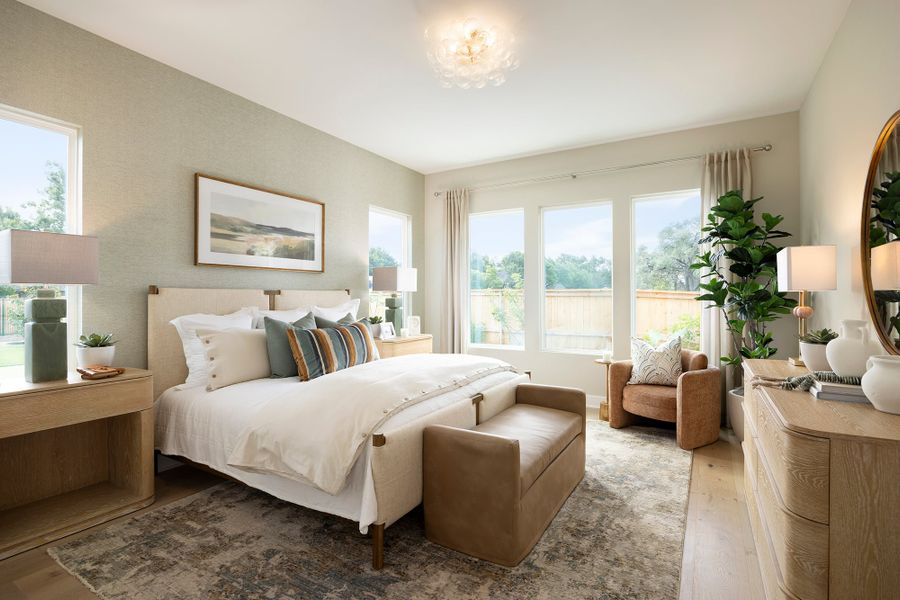 Furnished interior in a model home at Freedom at Anthem in Kyle (Image 28).
