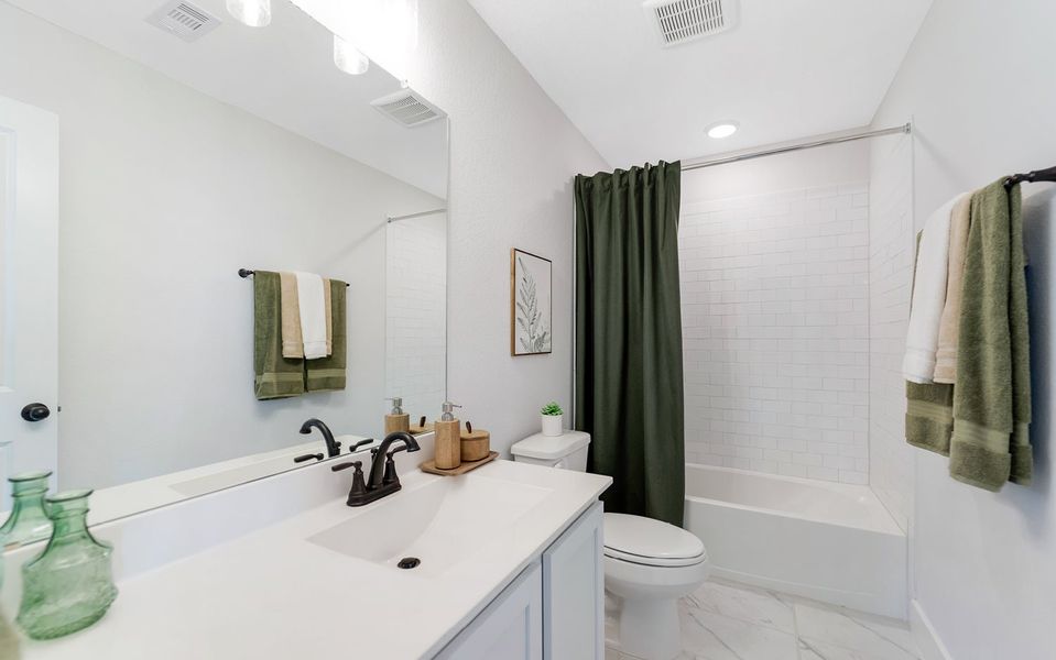 Furnished interior in a model home at Austin Colony in Angleton (Image 24).