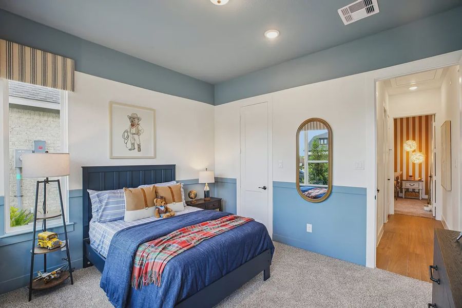 Furnished interior in a model home at Meridiana 50's in Manvel (Image 9).