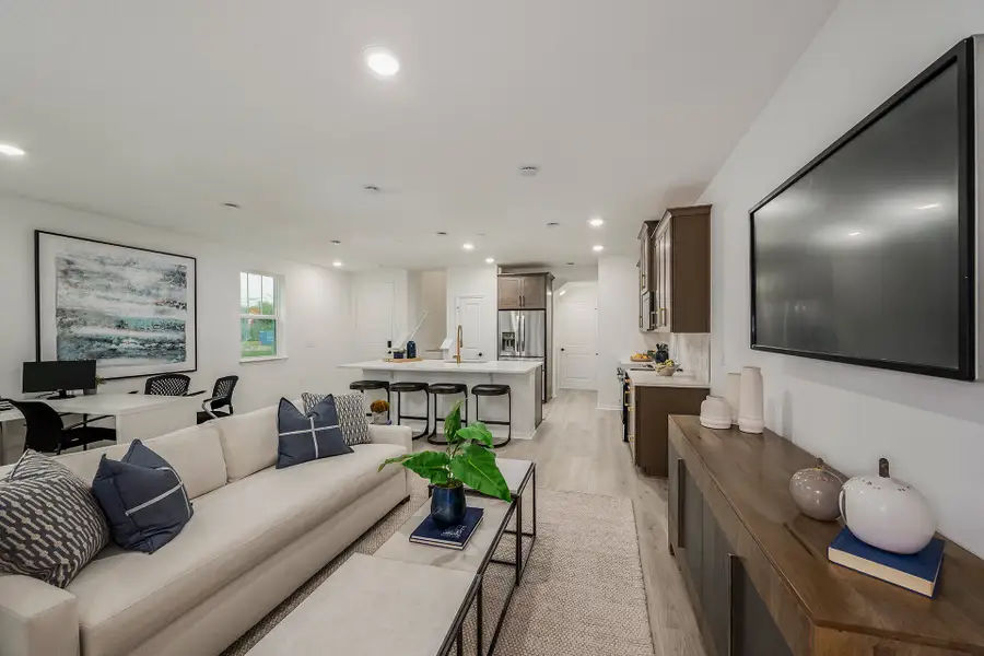 Furnished interior in a model home at Towns at Greenleaf in Oviedo (Image 5).