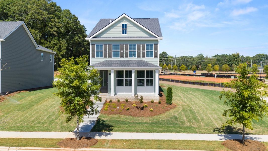 Front exterior of a home in the Brookland Commons community, located in Monroe, GA (Image 11).