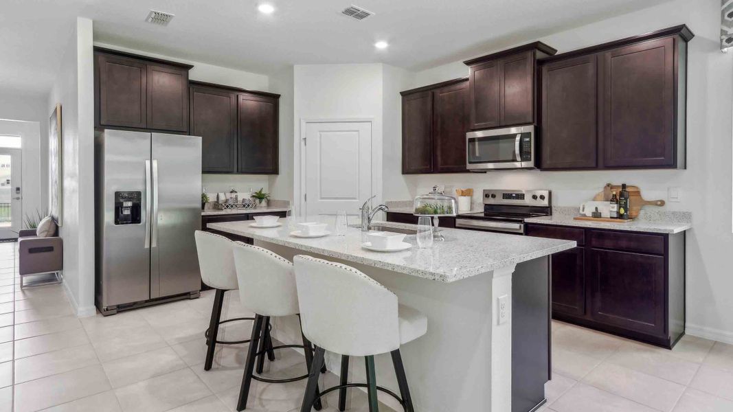 Furnished interior in a model home at Twisted Oaks in Wildwood (Image 4).