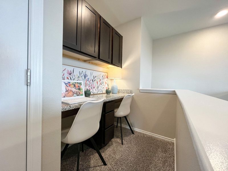 Furnished interior in a model home at Villas San Agustin in Laredo (Image 6).