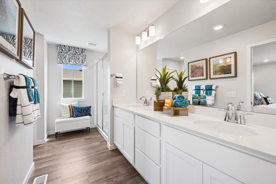 A bathroom with a tub and sink.