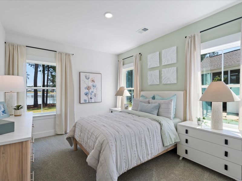 Furnished interior in a model home at The Coves at Lakes of Cane Bay in Summerville (Image 37). Furnished interior in a model home at The Coves at Lakes of Cane Bay in Summerville (Image 37).