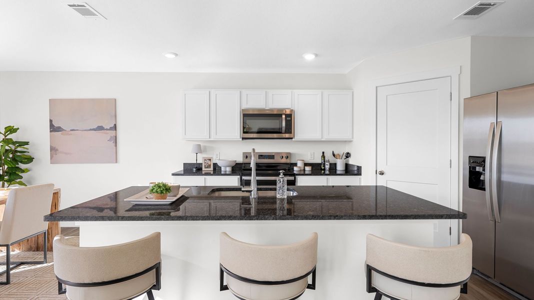 Furnished interior in a model home at Evergreen Landing in Rossville (Image 11).