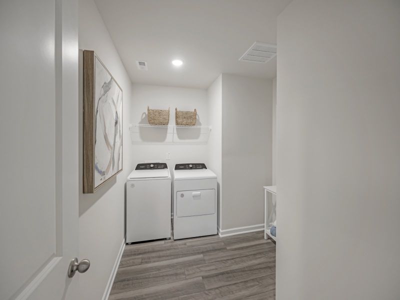 Doing laundry is easier than ever with the Taylorsville's large laundry room.