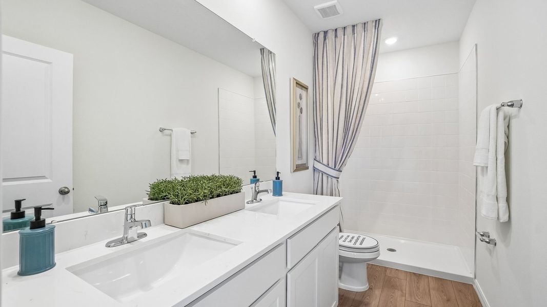 Furnished interior in a model home at Sanctuary at Citrus Park Townhomes in Tampa (Image 19).
