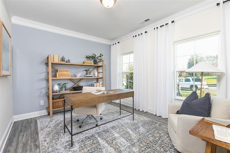 Furnished interior in a model home at Royal Pines in Trinity (Image 9).